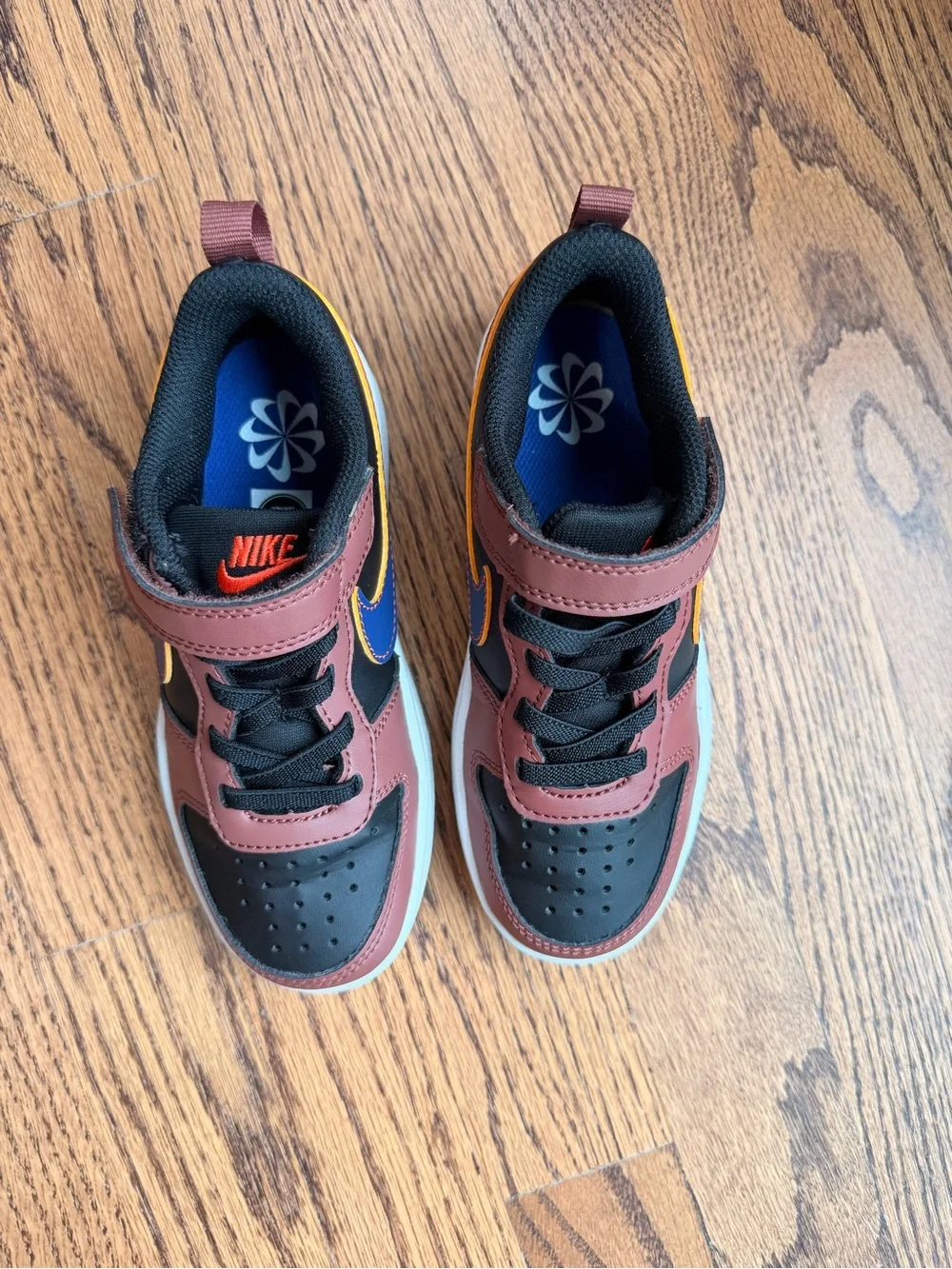 Nike Boys brown & black sneakers, orange & blue swoosh